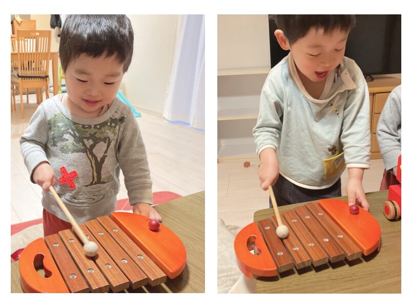 木琴のおもちゃで遊ぶ子ども